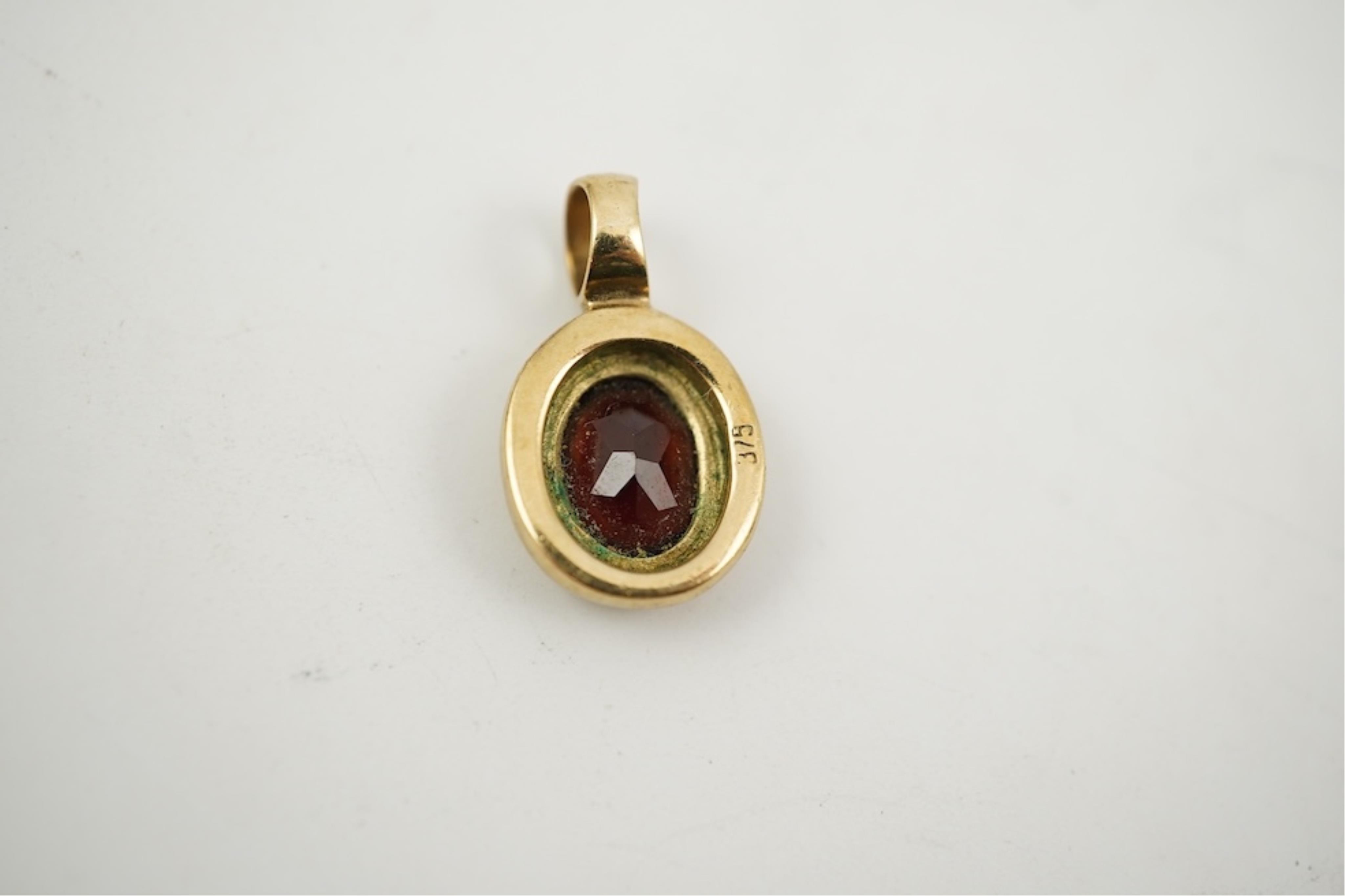 Five assorted modern 375 yellow metal and gem set pendants, a yellow metal and lapis lazuli set pendant (stamped 585?) 40mm, together with a yellow metal dragonfly brooch, a similar small pendant and a white metal bracel
